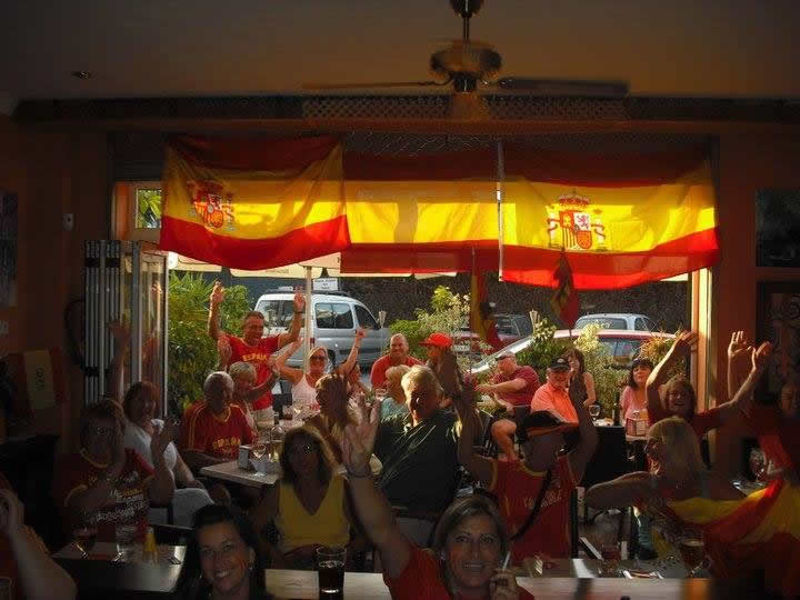 People watching The World Cup in Lola's Bar